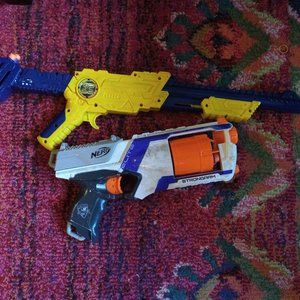 2 foam shooter guns (one NERF)